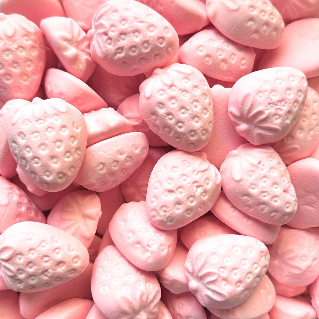 Close up of strawberry marshmallows – soft pink Swedish candy shaped like strawberries