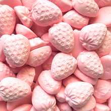 Close up of strawberry marshmallows – soft pink Swedish candy shaped like strawberries