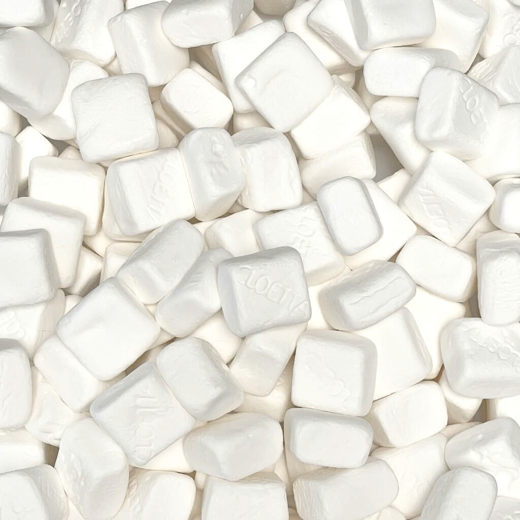Close up of Sockerbitar vanilla marshmallows – white Swedish candy cubes
